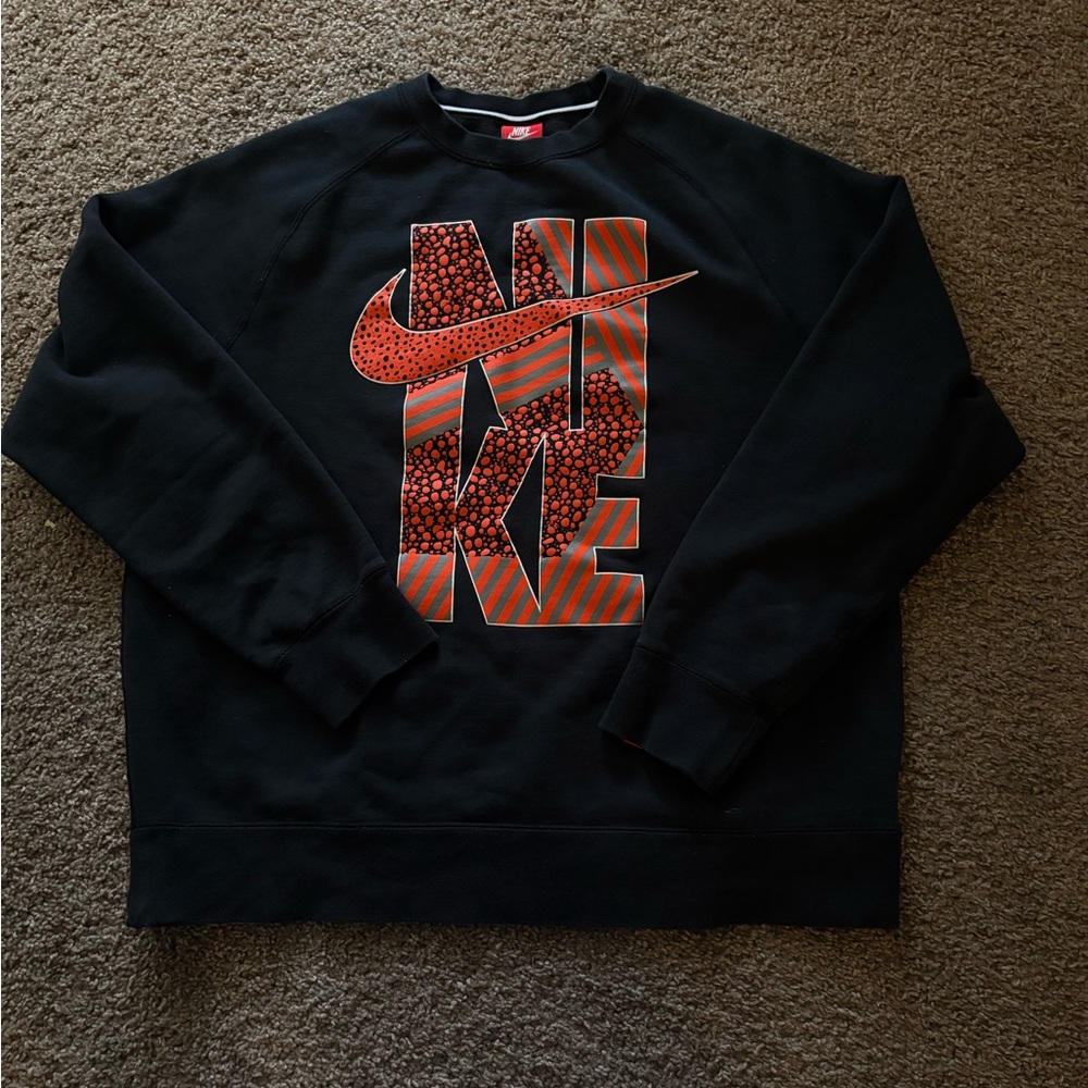 Nike Black and Orange Crewneck Sweater with Bold Graphics